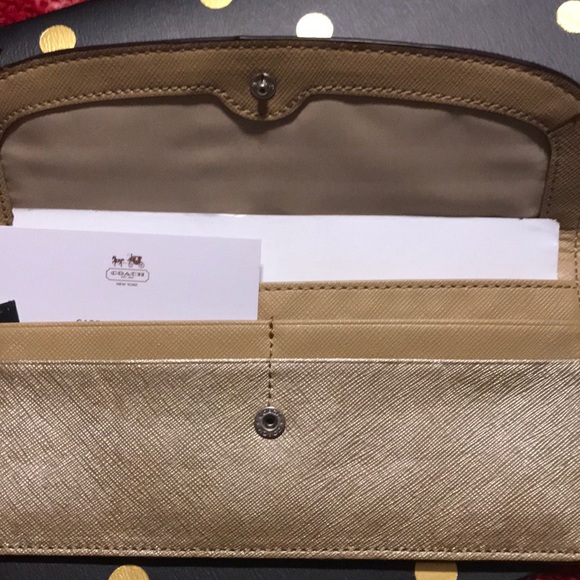 Coach Handbags - One DAY sale NWT Coach Slim Wallet gold